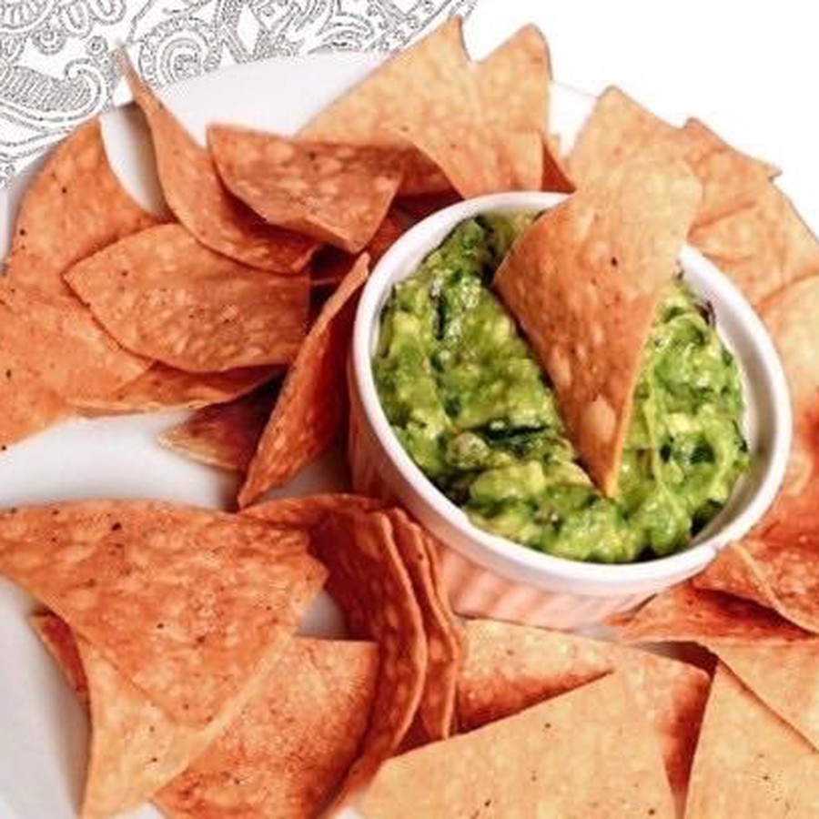 Guacamole with a plate of tortilla chips